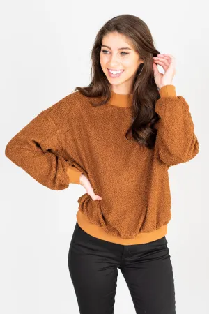 Feeling At Peace Brick Orange Faux Shearling Sweatshirt